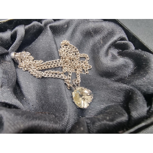 140 - A 18k gold necklace, with a pendant set brilliant cut diamond of approximately 1.5ct.... 