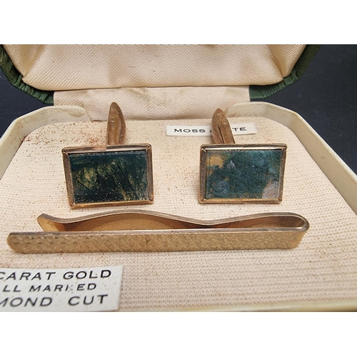 147 - A cased pair of 9ct gold moss agate cufflinks and engine turned tie clip, gross weight 15g.... 