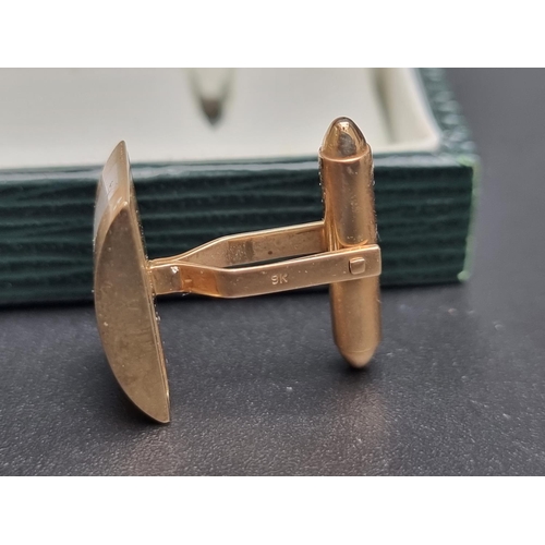 148 - A pair of 9ct gold and mother-of-pearl cufflinks, gross weight 8.7g.