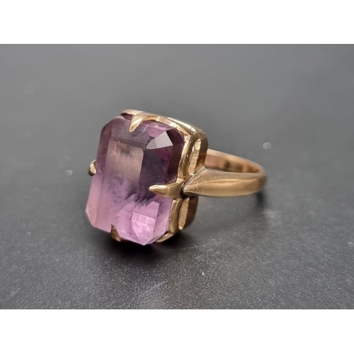 156 - A yellow metal amethyst ring, stamped, size L 1/2.