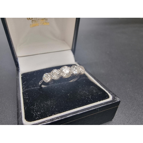 161 - A white metal ring set five graduated old cut diamonds, total estimated weight 1ct, size S.... 