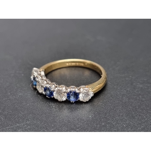 164 - An 18ct gold sapphire and diamond seven stone ring, set four diamonds, totalling approximately 1ct a... 