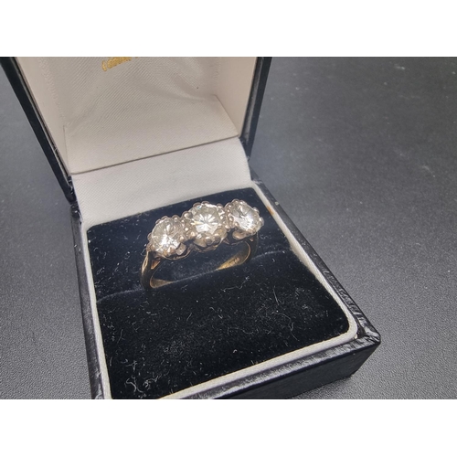 166 - An 18ct gold diamond three stone ring, estimated total of 1.75 -2ct, size P 1/2, gross weight 5.9g.... 