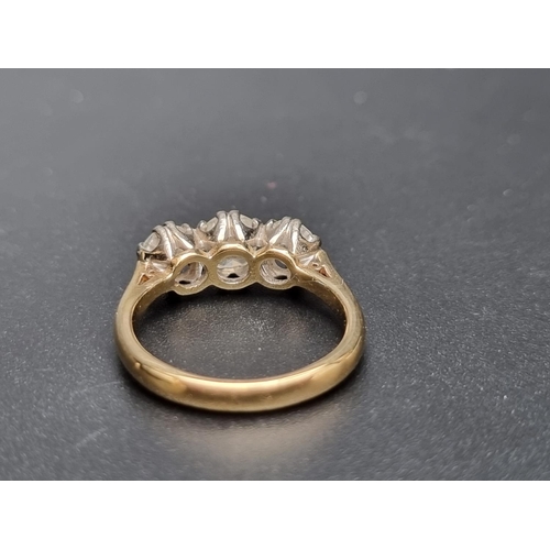 166 - An 18ct gold diamond three stone ring, estimated total of 1.75 -2ct, size P 1/2, gross weight 5.9g.... 