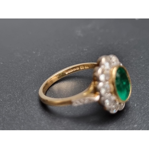 171 - An 18ct gold emerald and diamond cluster ring, set central faceted oval emerald surrounded by ten br... 