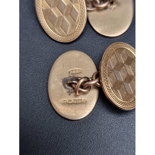 194 - A pair of 9ct gold cufflinks, with chain link connectors, 12g.