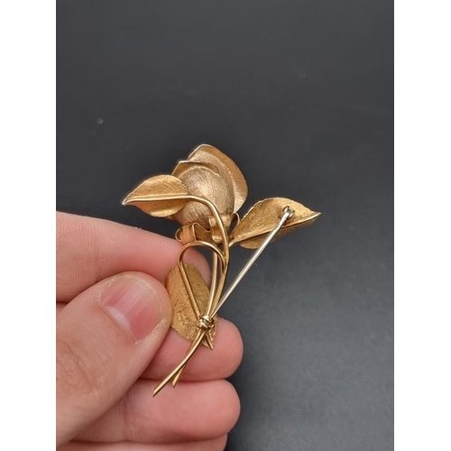 197 - An 18ct textured gold rose bud brooch, Birmingham 1965, numbered 7/22, 53mm, 11.5g.