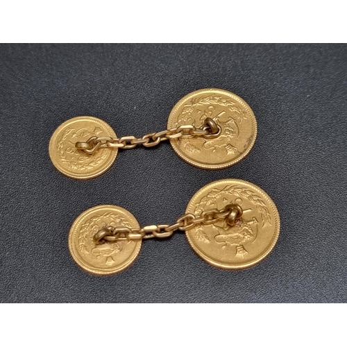 202 - A pair of Iranian gold half Pahlavi and quarter Pahlavi coin cufflinks, with chain connectors.... 