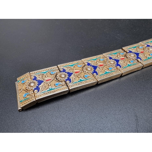 207 - A vintage gilt metal and coloured enamel bracelet, each link stamped '925', 18cm approximately.... 