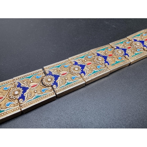 207 - A vintage gilt metal and coloured enamel bracelet, each link stamped '925', 18cm approximately.... 