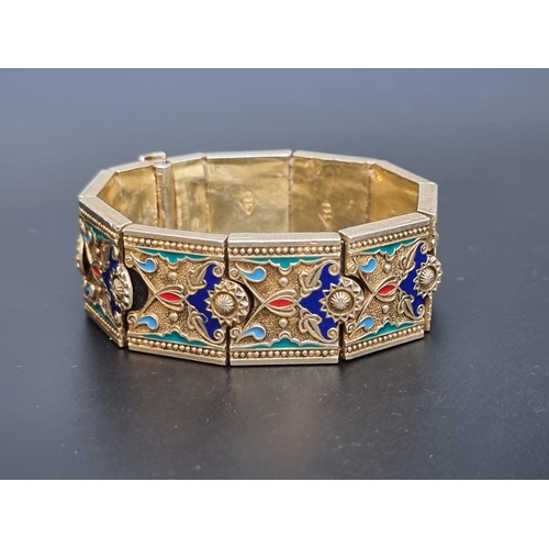 207 - A vintage gilt metal and coloured enamel bracelet, each link stamped '925', 18cm approximately.... 