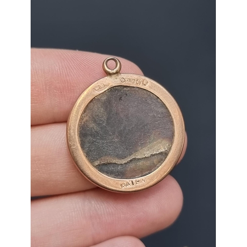 210 - A 9ct gold and tortoiseshell RNVR pendant, 28mm diameter; together with a silver I.D bracelet and ot... 