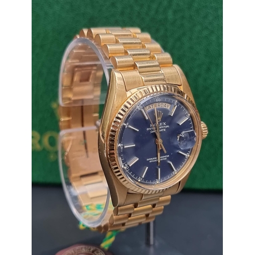 233 - A circa 1975 Rolex 'President' Oyster Perpetual Day-Date 18ct gold wristwatch, blue dial,  36mm, Ref... 