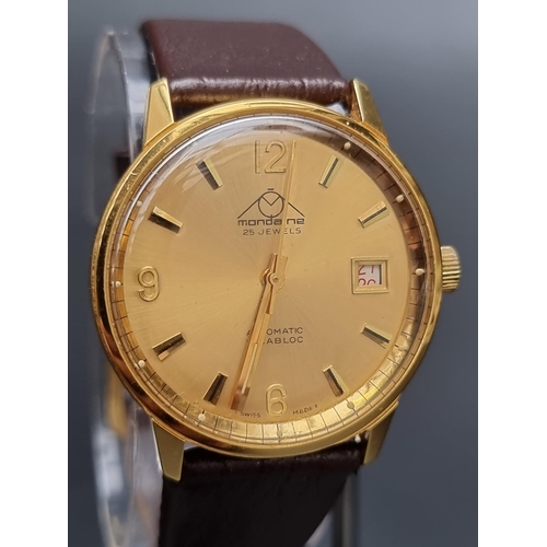 249 - A Mondaine '25 jewels' gold plated automatic wristwatch, 35mm, on brown leather strap.... 