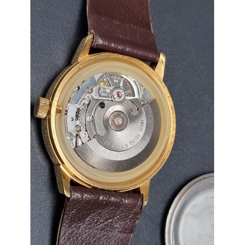 249 - A Mondaine '25 jewels' gold plated automatic wristwatch, 35mm, on brown leather strap.... 