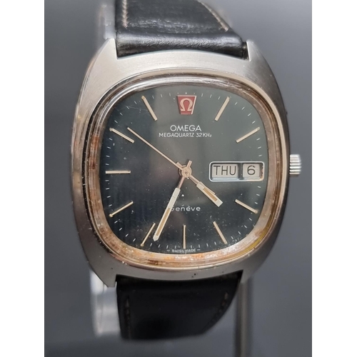 251 - A vintage Omega Megaquartz 32KHz, stainless steel wristwatch, 44mm, on leather strap with Omega clas... 