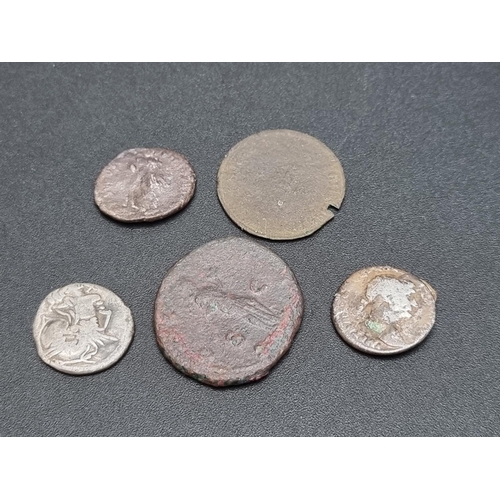 283 - Coins: a Roman Republic silver denarius, 70mm, 3.6g; together with four other Roman and ancient coin... 