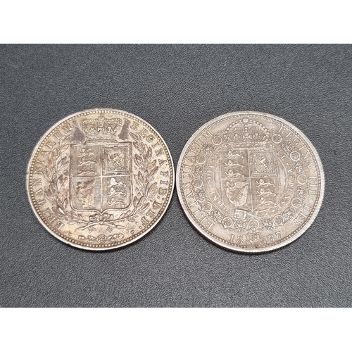 299 - Coins: two Victoria silver half crowns 1877 and 1887. (2)