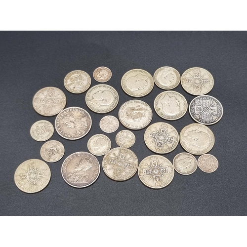 309 - Coins: a small quantity of UK silver and part silver coinage; together with two George V Indian one ... 