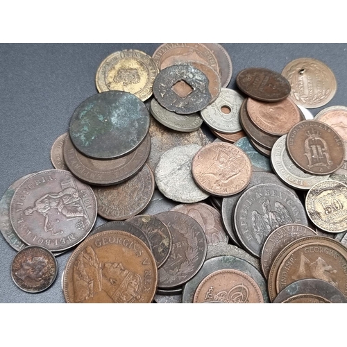 322 - Coins: an interesting group of UK and world coins and tokens. (qty)