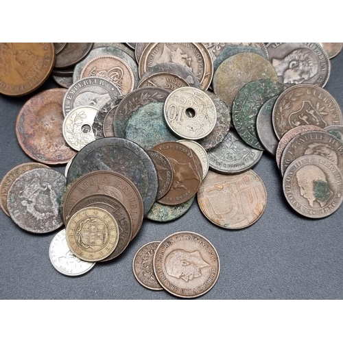 322 - Coins: an interesting group of UK and world coins and tokens. (qty)