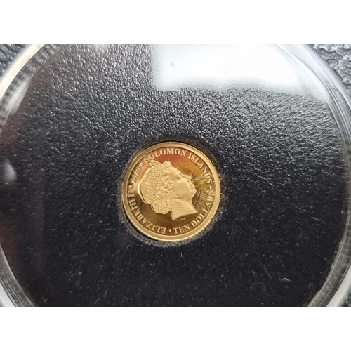 330 - Coins: a 2019 Alderney 'D-Day 75th Anniversary 1944-2019' gold quarter sovereign, with CoA; together... 