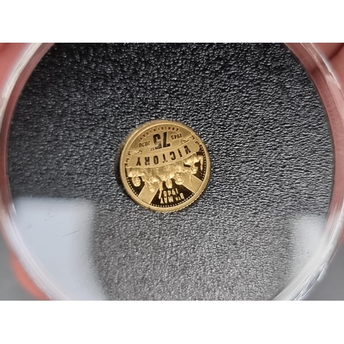 330 - Coins: a 2019 Alderney 'D-Day 75th Anniversary 1944-2019' gold quarter sovereign, with CoA; together... 