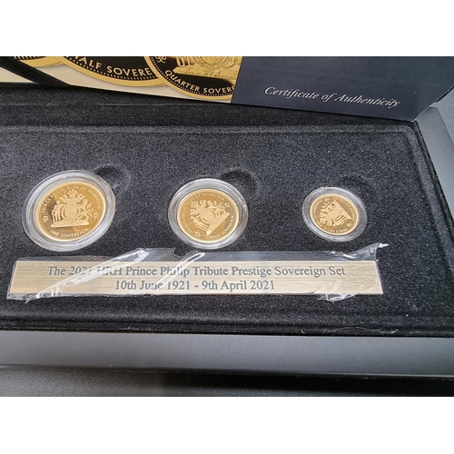 334 - Coins: a cased '2021 HRH Prince Philip Tribute Gold Sovereign Prestige Set', comprising: sovereign; ... 