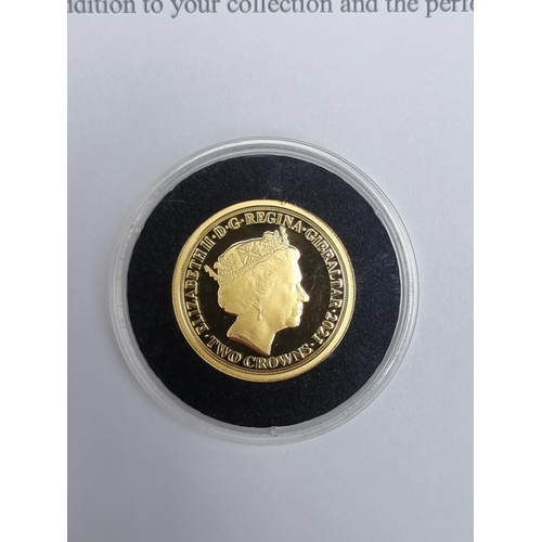 335 - Coins: a 2021 Gibraltar 'Strength & Stay: Seven Decades of Devotion' 9ct gold proof two crown co... 