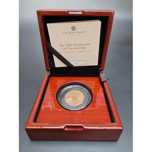 352 - Coins: a cased 2021 Royal Mint 'The 50th Anniversary of Decimal Day' 15.5g red gold proof limited ed... 