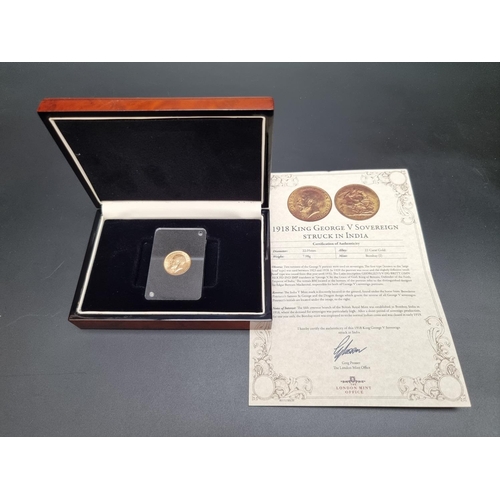 354 - Coins: a cased '1918 King George V Sovereign struck in India', Bombay Mint, with CoA.... 