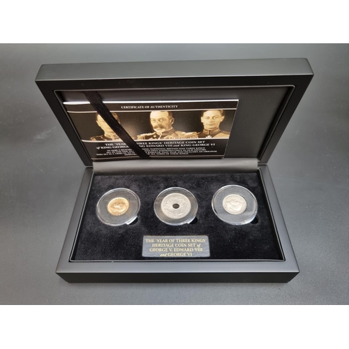 356 - Coins: a cased 'The Year of Three Kings Heritage Coin Set' comprising: a 1925 George V 1925 gold sov... 