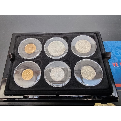 363 - Coins: a cased 'The VE Day 75th Anniversary Coin Set 1945-2020', eleven British coins, to include a ... 