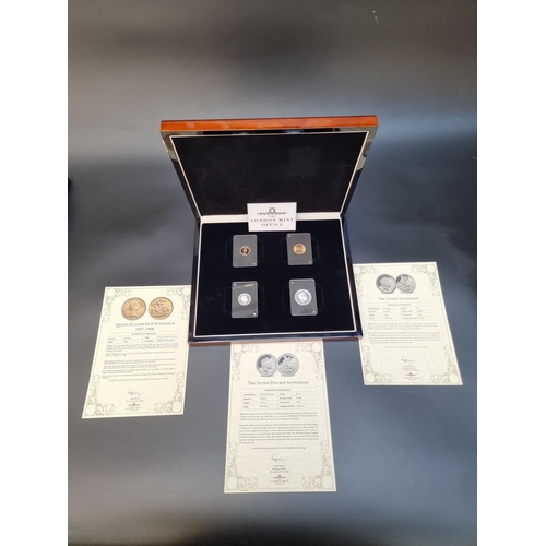 365 - Coins: a cased set of four Elizabeth II coins, comprising: a 1963 brilliant uncirculated gold sovere... 