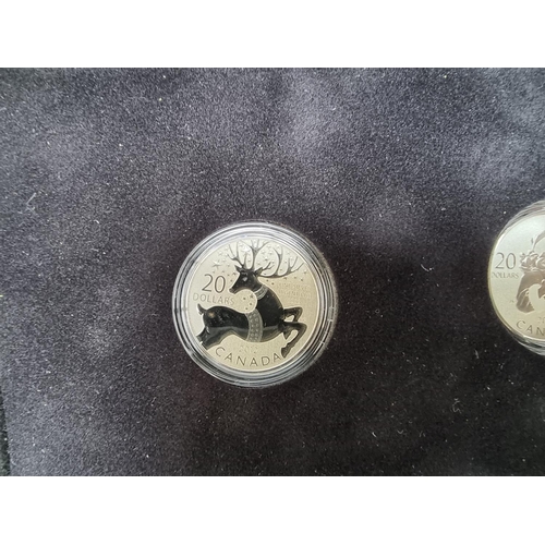 371 - Coins: a cased limited edition 'The Canadian Silver Voyageur Set' of three silver coins, comprising:... 