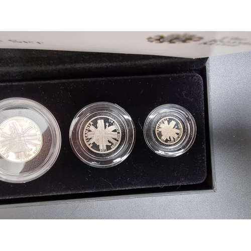 372 - Coins: a cased 2011 Royal Mint 'Britannia' four coin silver proof set, containing 20p to £2 coins, w... 