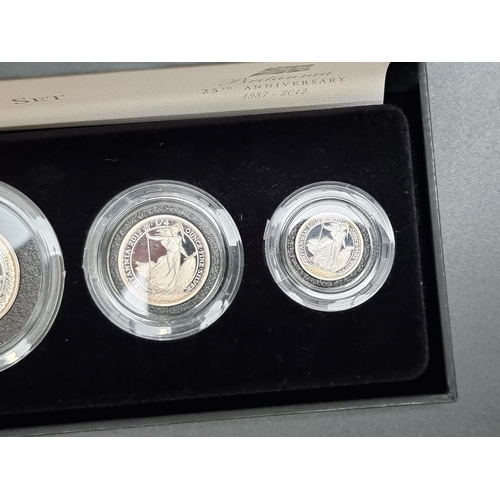 373 - Coins: a cased 2012 Royal Mint 'Britannia' four coin silver proof set, containing silver £2 to silve... 