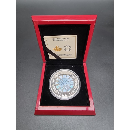 377 - Coins: a cased 2015 Royal Canadian Mint 'Lustrous Maple Leaves' limited edition proof 50 dollar five... 