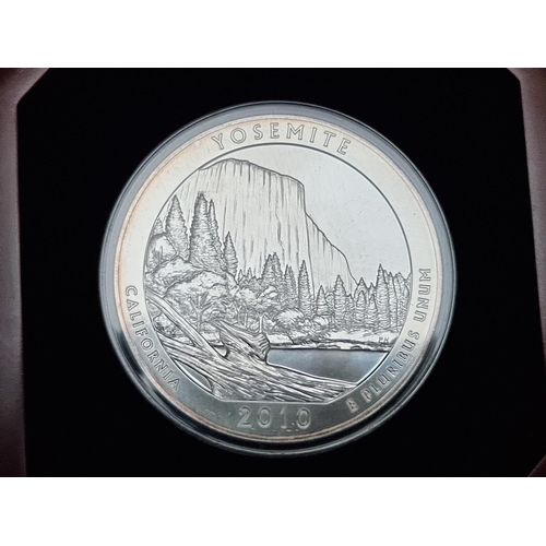 379 - Coins: a cased 2010 United States Mint 'National Parks' Yosemite El Capitan silver five ounce bullio... 