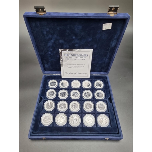 382 - Coins: a cased Westminster 'The United States 50 States Quarters Collection' containing 50 platinum ... 