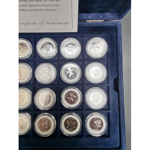 382 - Coins: a cased Westminster 'The United States 50 States Quarters Collection' containing 50 platinum ... 