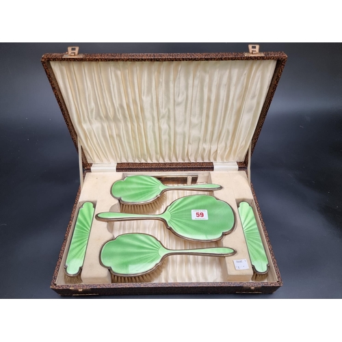 59 - A cased silver and guilloche enamel six piece dressing table set, by Albert Carter, Birmingham 1932.... 