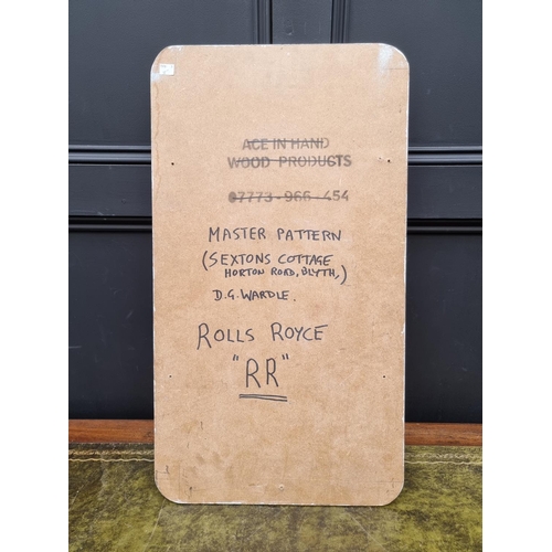 1267 - Automobilia: a silver painted MDF Rolls Royce sign, inscribed verso, 74 x 40.5cm.  ... 