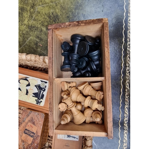 1316 - Three old wood chess sets; and together with two playing card packs. 