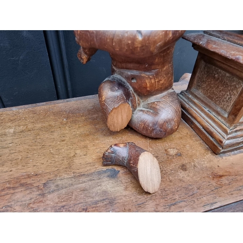 1346 - An antique Continental carved pine dressing table mirror, 79cm high, (damage and losses).... 