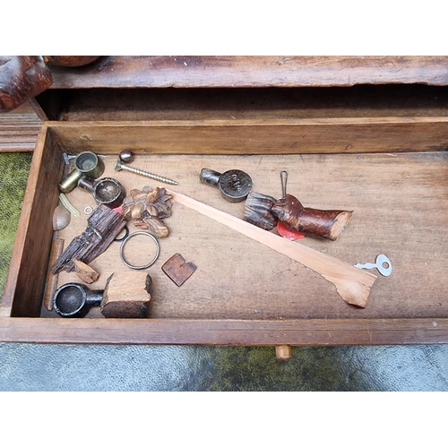 1346 - An antique Continental carved pine dressing table mirror, 79cm high, (damage and losses).... 