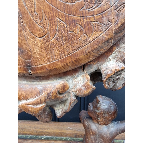 1346 - An antique Continental carved pine dressing table mirror, 79cm high, (damage and losses).... 