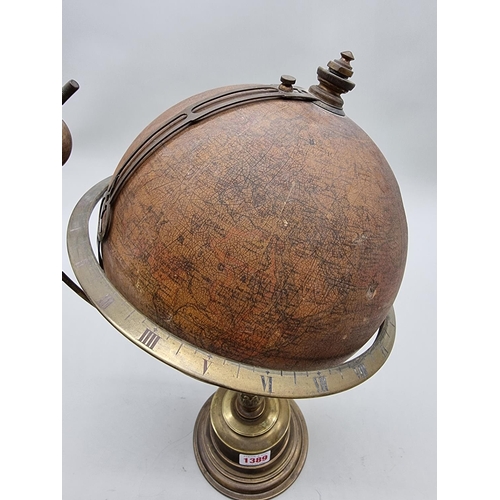 1389 - A scarce early 20th century globe timepiece, inscribed 'The Empire Clock', 39cm high, (faults).... 