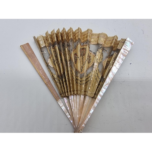 1396 - Five fans, to include a painted silk and bone example; and another painted with swallows. ... 