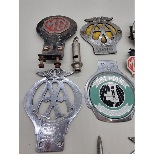 1399 - Automobilia: a collection of car radiator badges and others. 